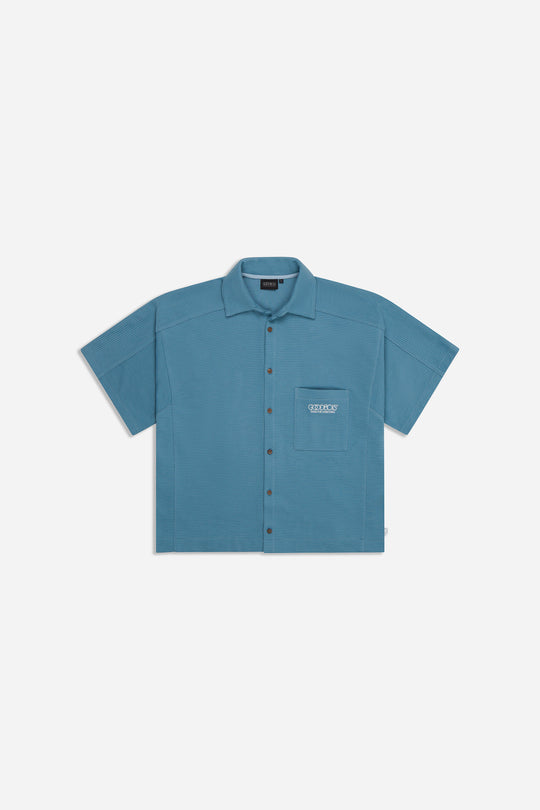 OG LOGO PIQUE BUTTON SHIRT BLUE